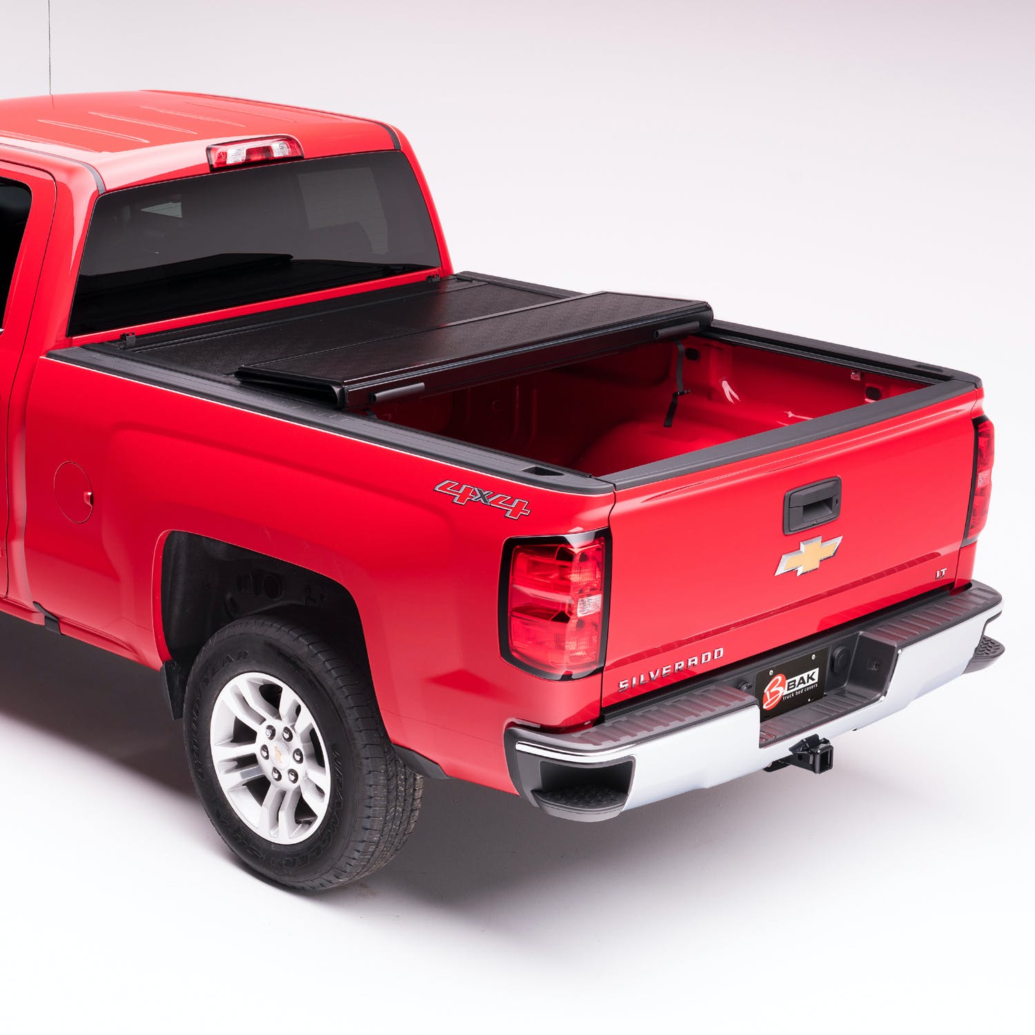 BAK Industries BAKFlip F1 Hard Folding Truck Bed Cover | Fiberglass Cover