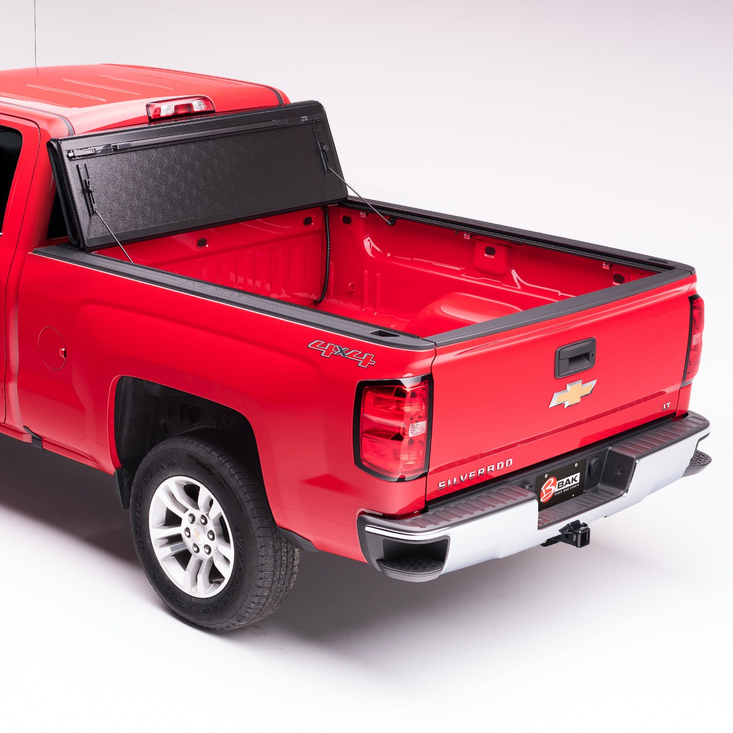 BAK Industries BAKFlip F1 Hard Folding Truck Bed Cover | Fiberglass Cover